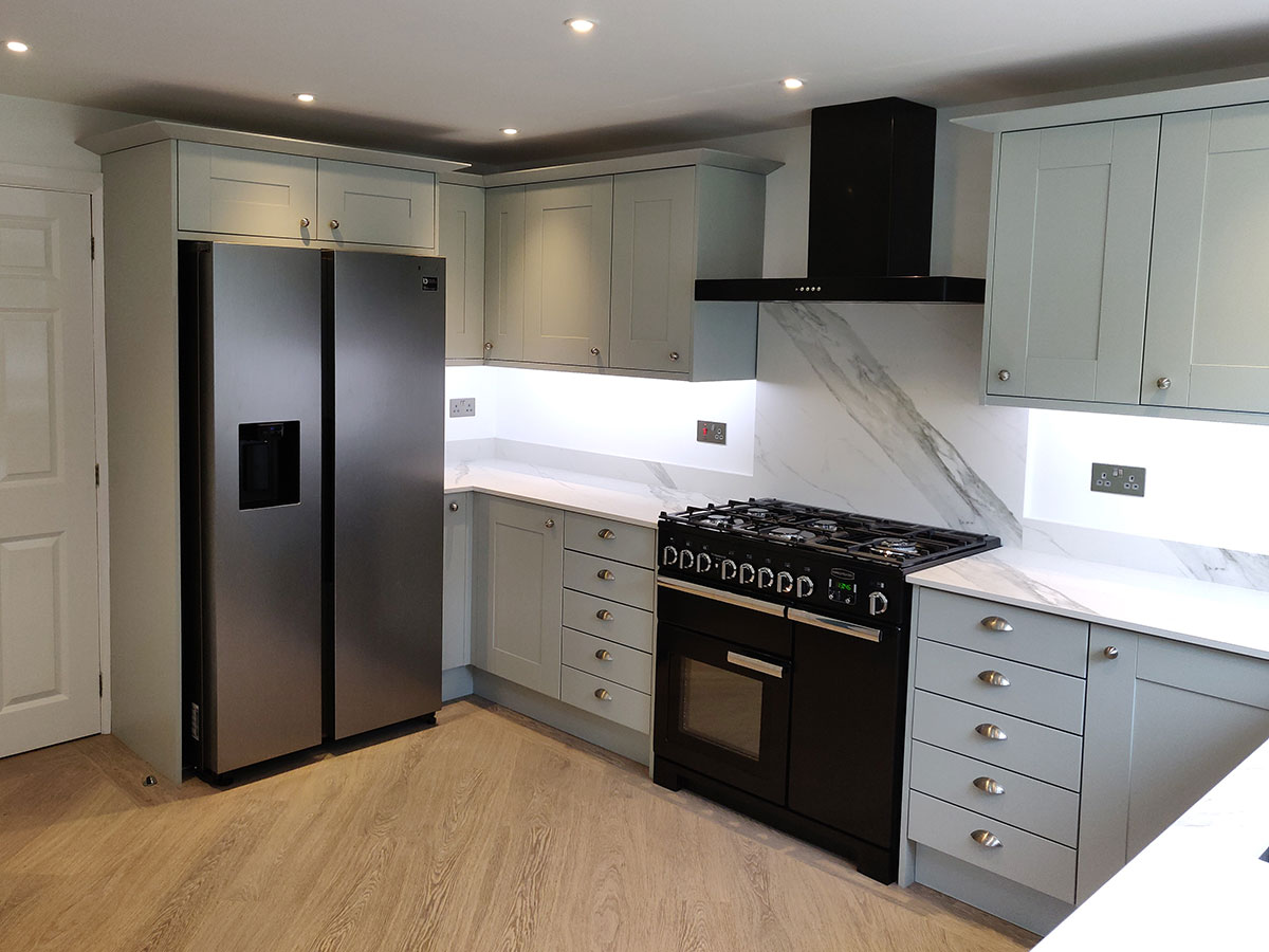 Grey style kitchen with modern fridge in Congleton Cheshire