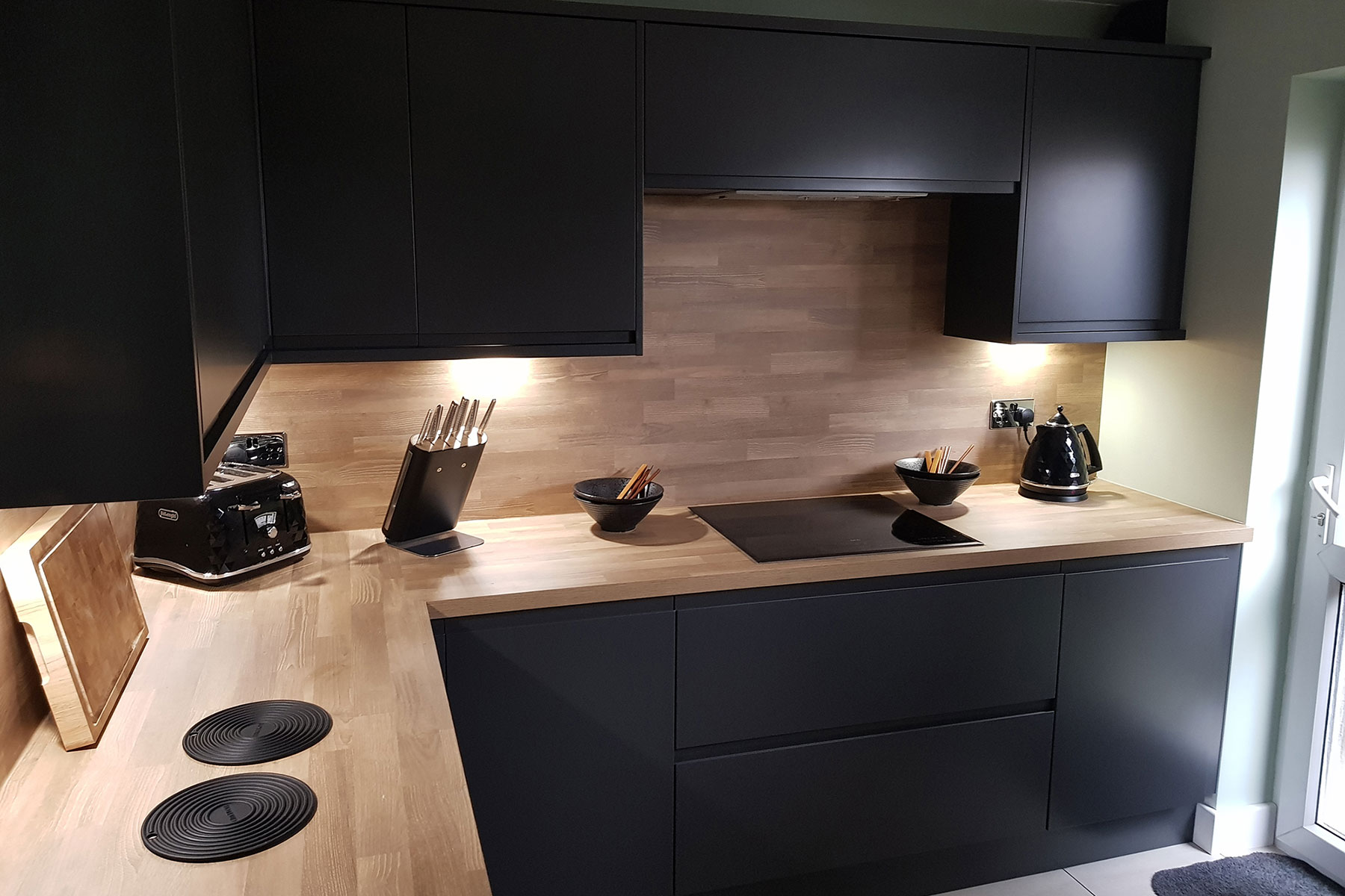 Deep black Kitchen style fitted by Cheshire Life Kitchens in Congleton Cheshire