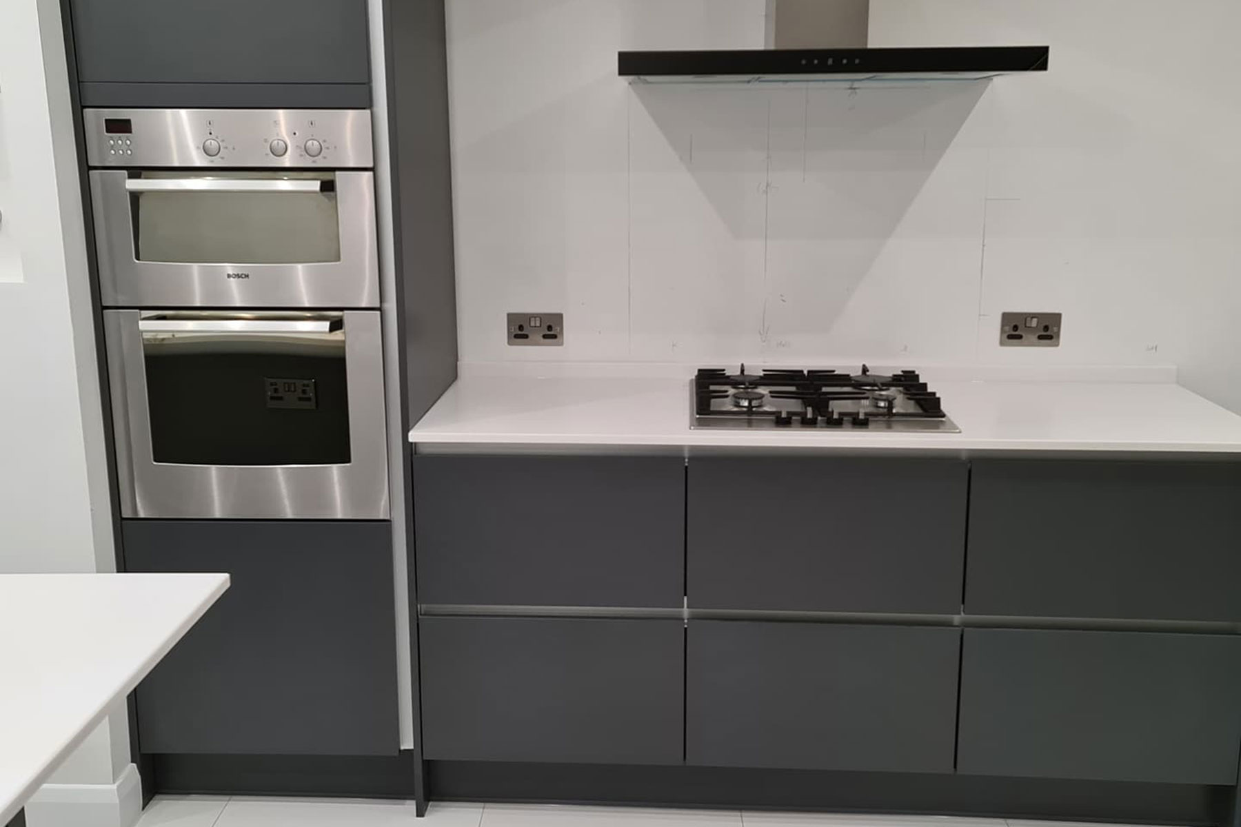 White worktops with dark grey doors, kitchen near congleton in cheshire