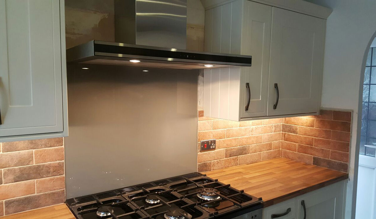 Modern stainless steel cooker hood installed in cheshire home